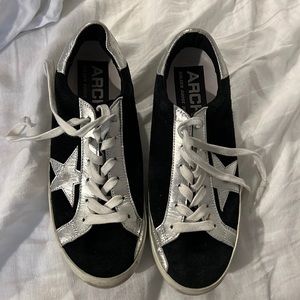Golden Goose black suede and metallic silver sneakers